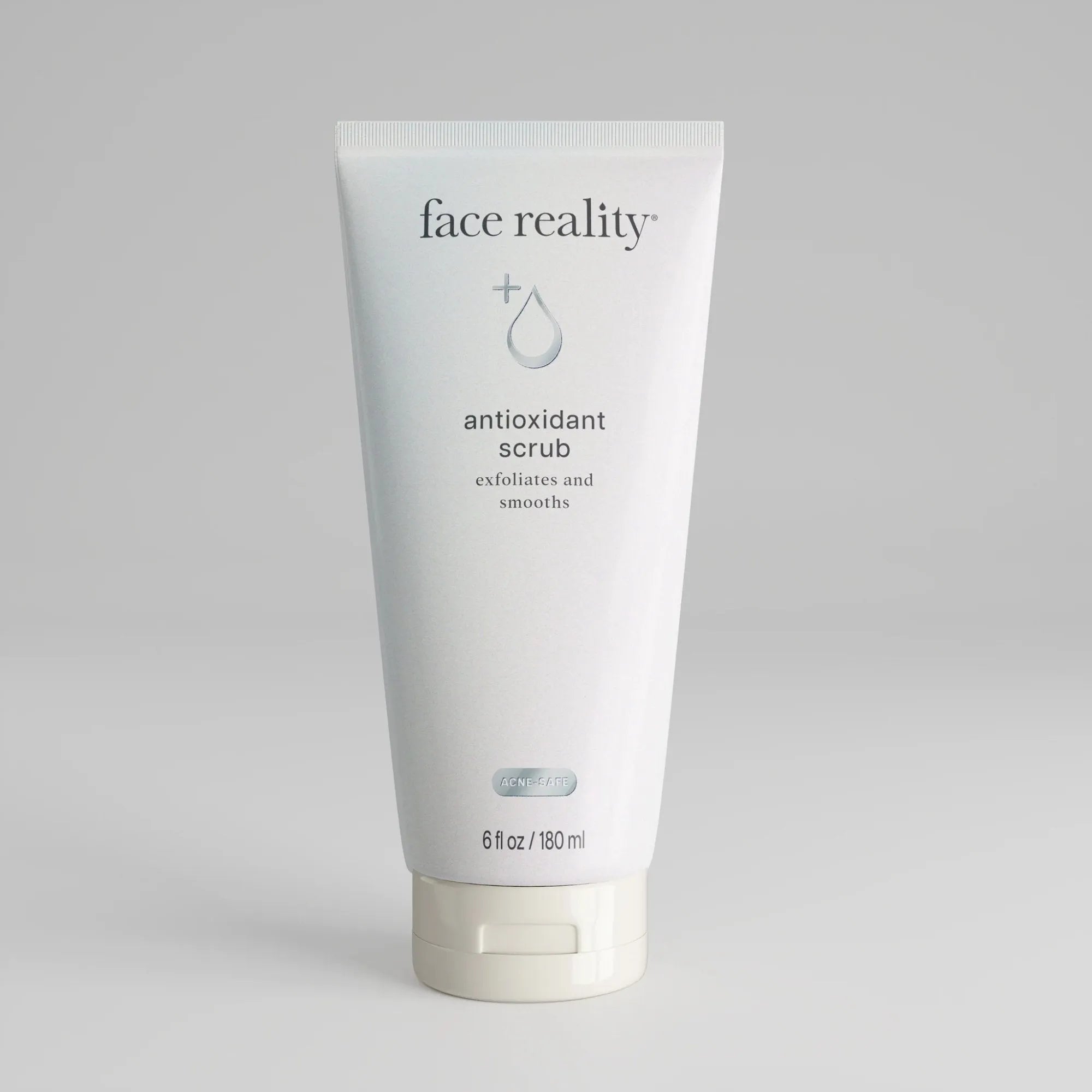 Face Reality antioxidant scrub tube on a plain background, exfoliating skincare product