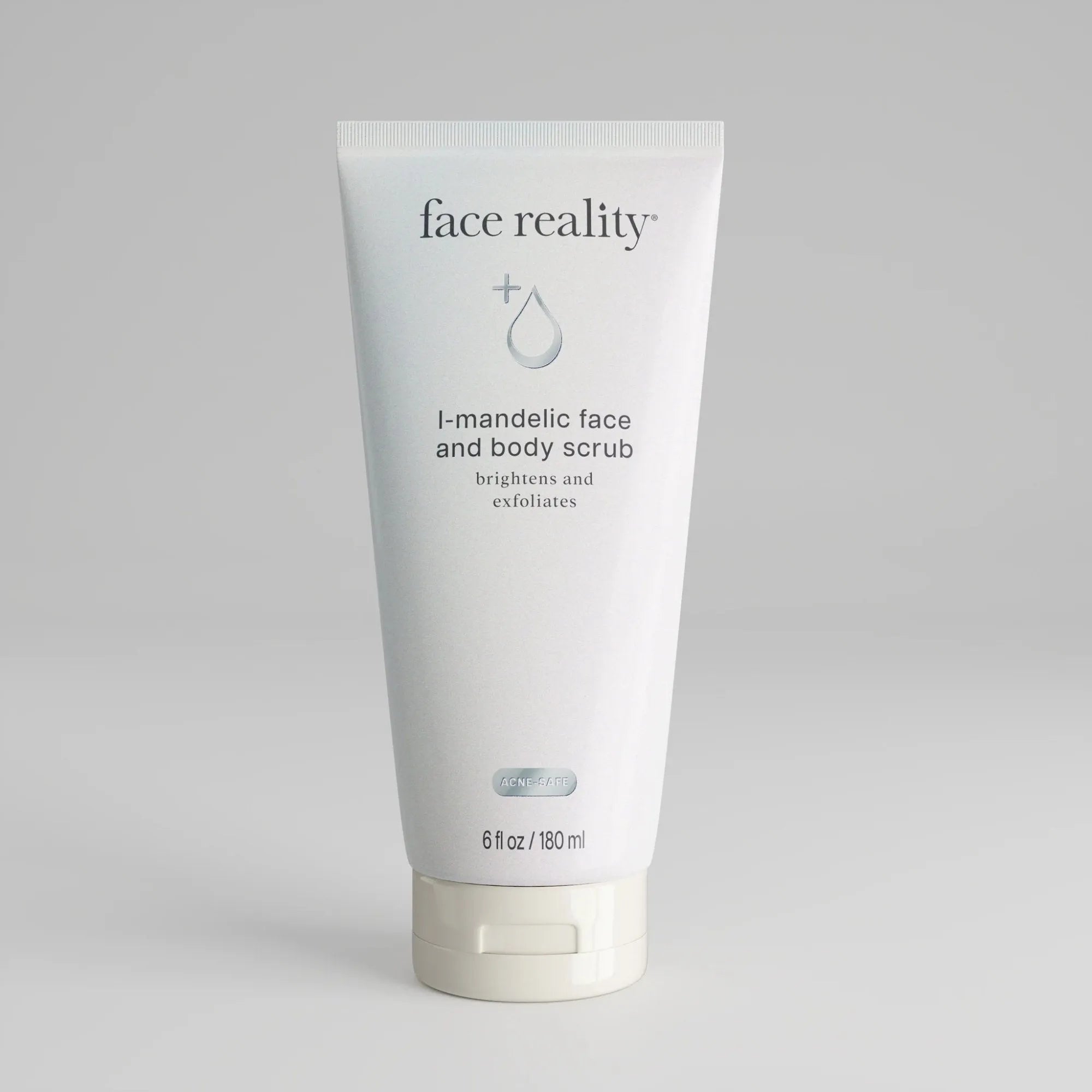 Face Reality l-mandelic face and body scrub tube on white background, clean skincare product